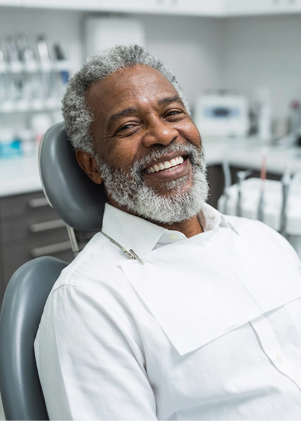 Man smiling in dental chair