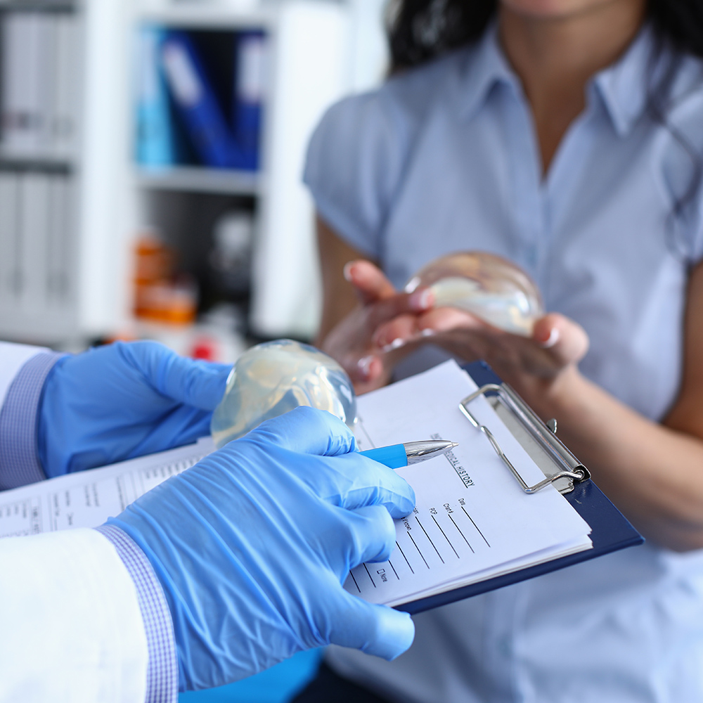 Breast augmentation patient wearing support garment