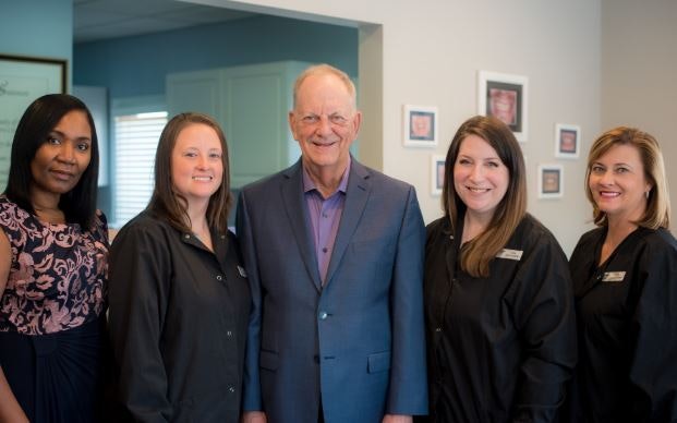 Dr. Green and the dental team