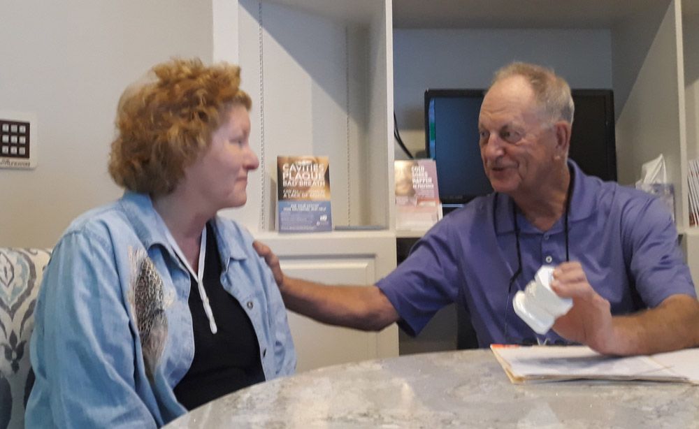 Dr. Greene with a patient