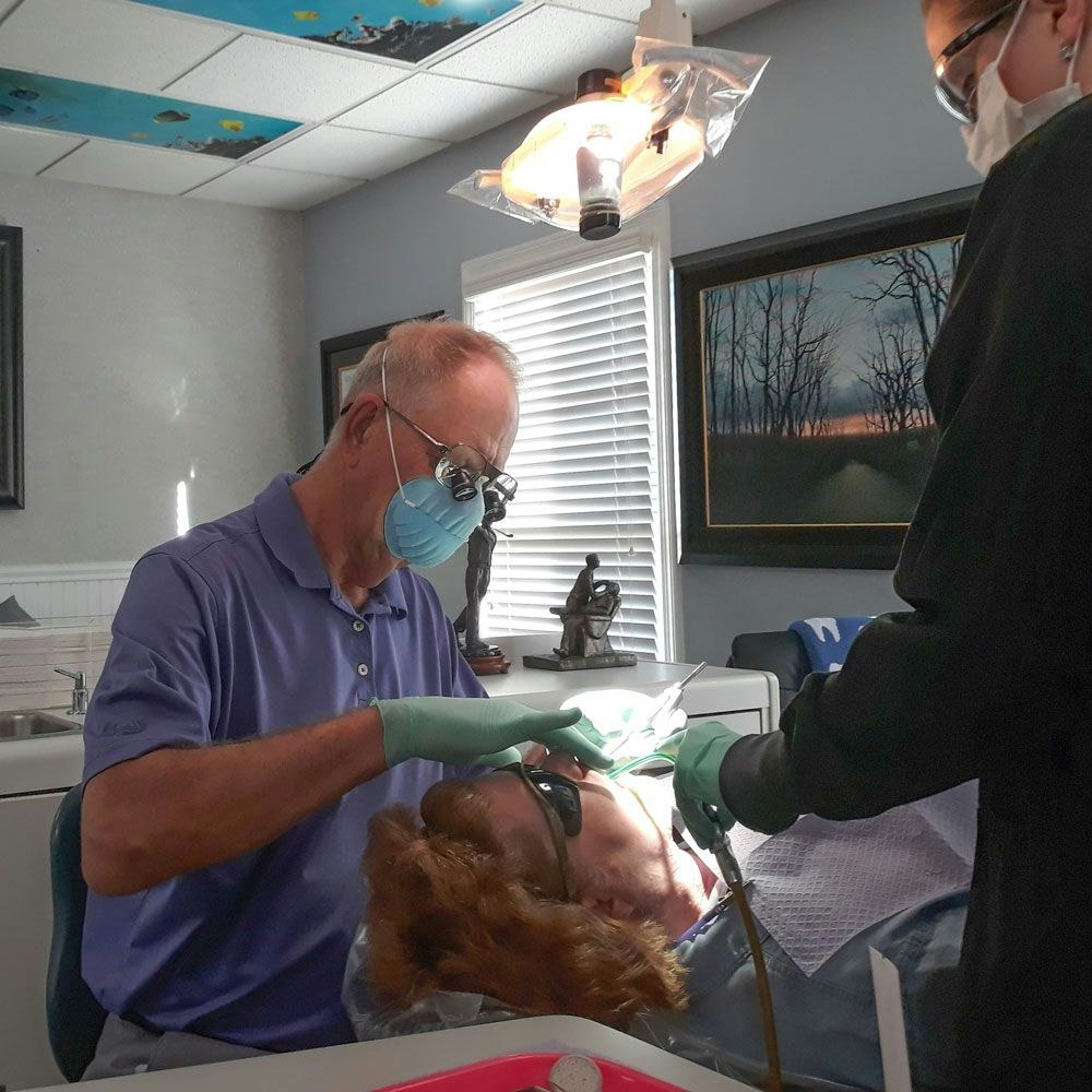 Dr. Greene working on a dental patient