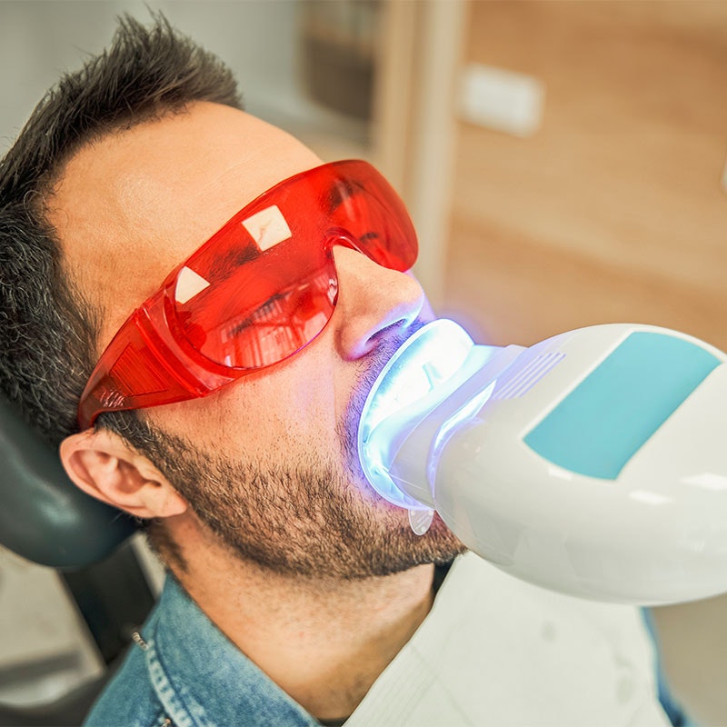 Man undergoing teeth whitening