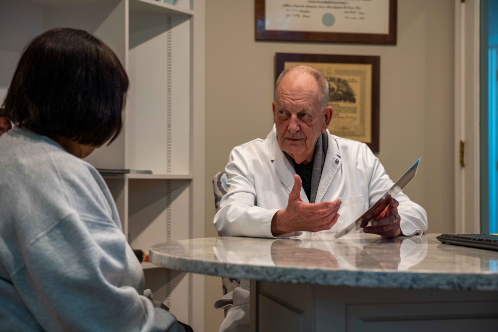 Dr. Greene working on a dental patient