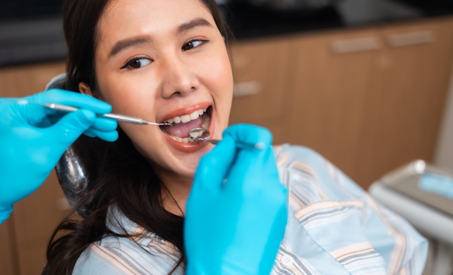 Young woman getting a dental exam