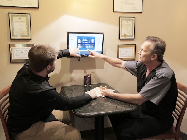 Dr. Terry Lee Work meeting with a patient