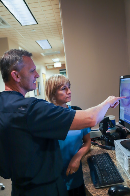 Drs. looking at computer