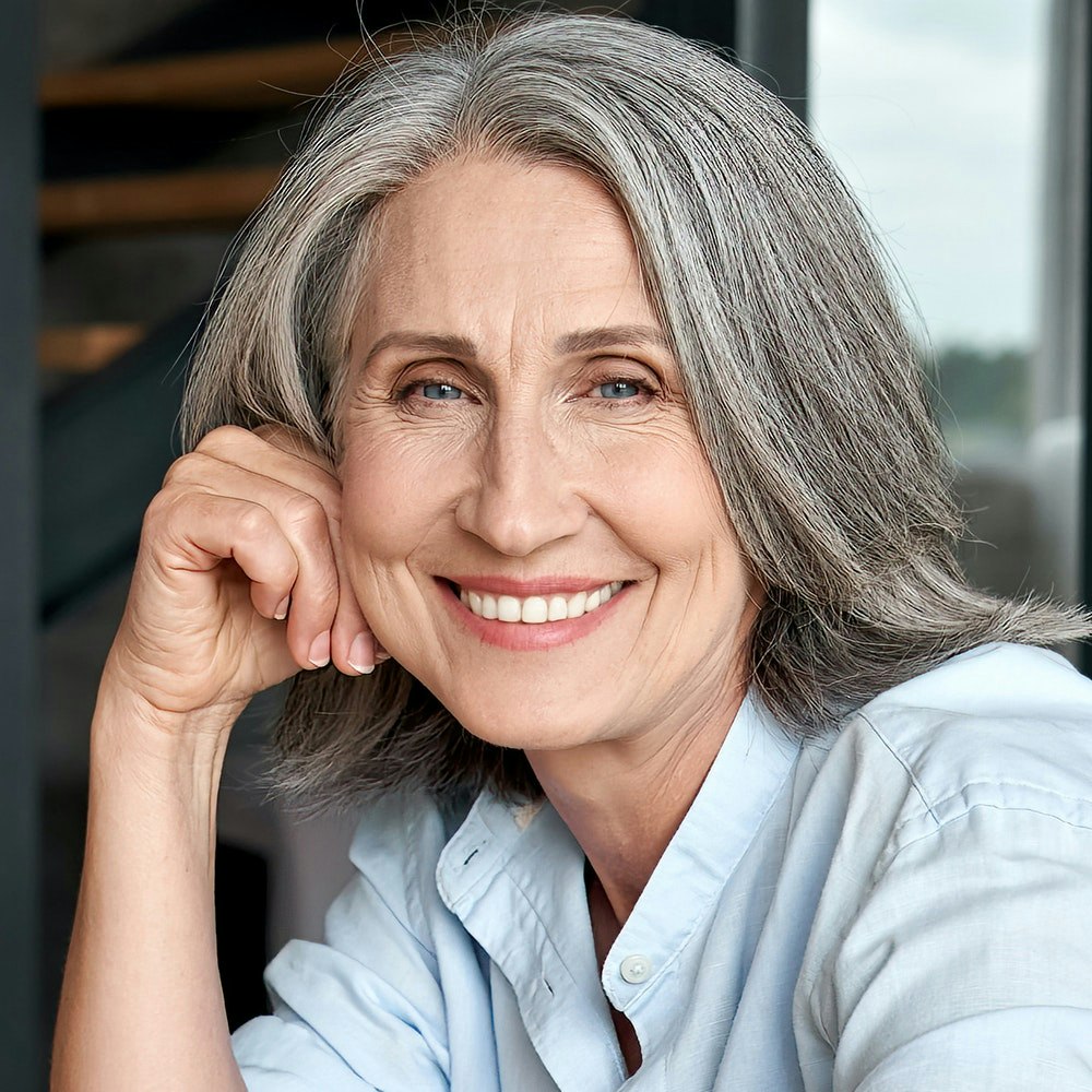 Older woman smiling confidently