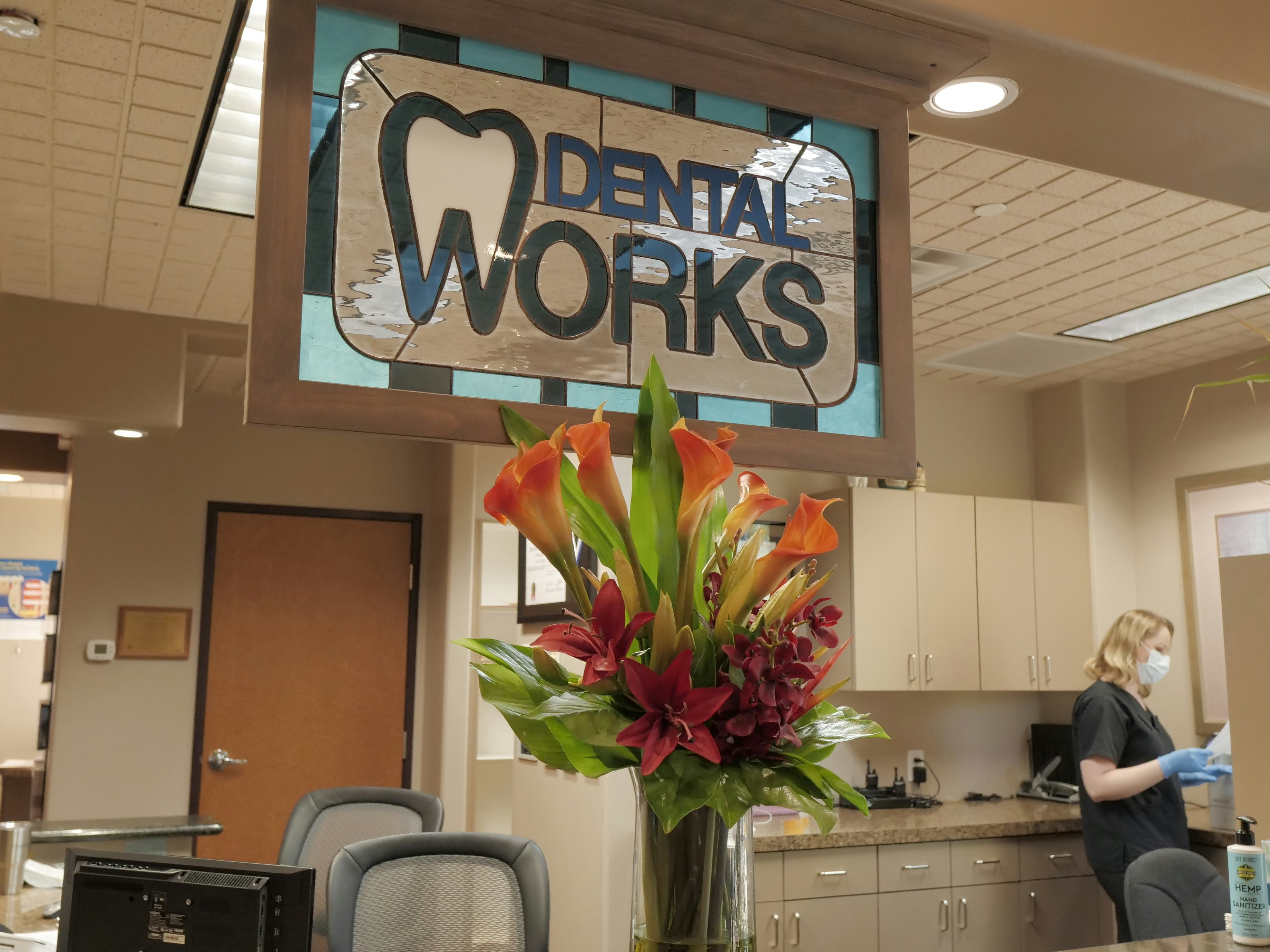Dental Works sign at welcome table