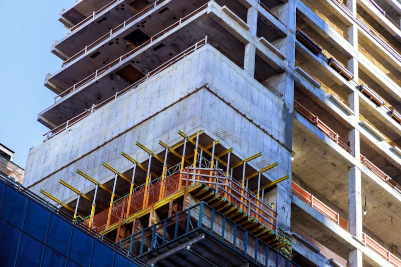Metal beams portruding from the building