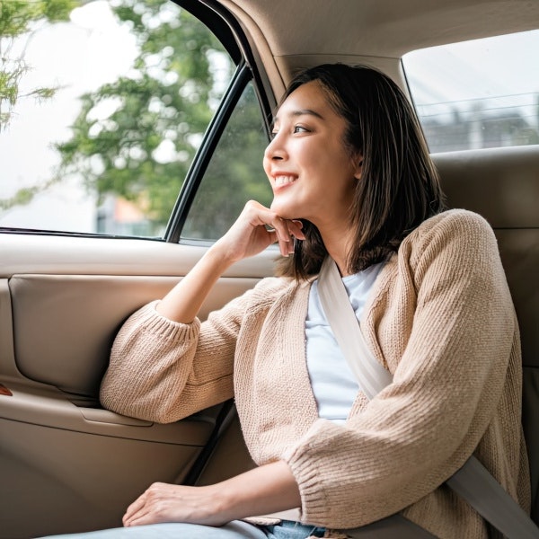 Female passenger looking out the window
