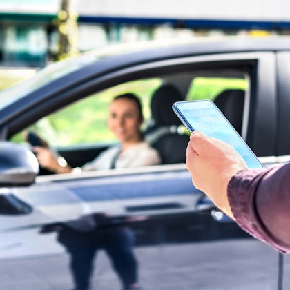 driver picking up passenger