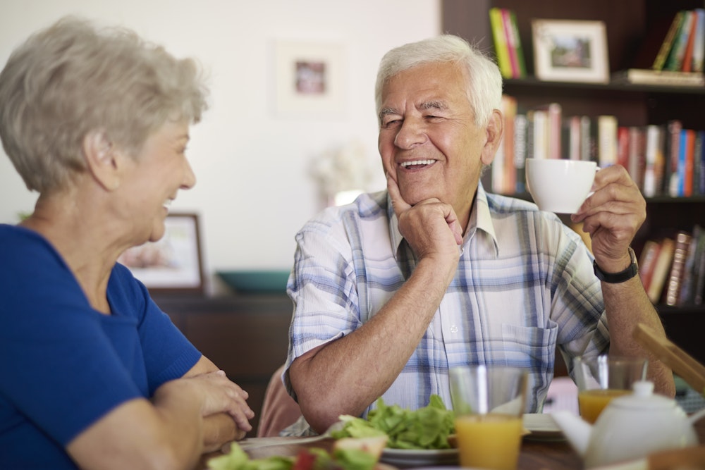 Older couple eating lunch