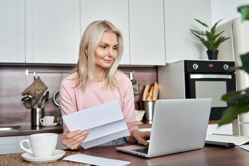 Woman paying bills