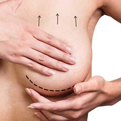 woman holding her own breast
