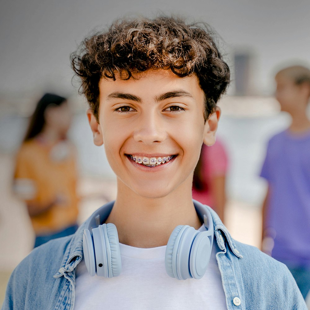 Woman with hand over mouth
