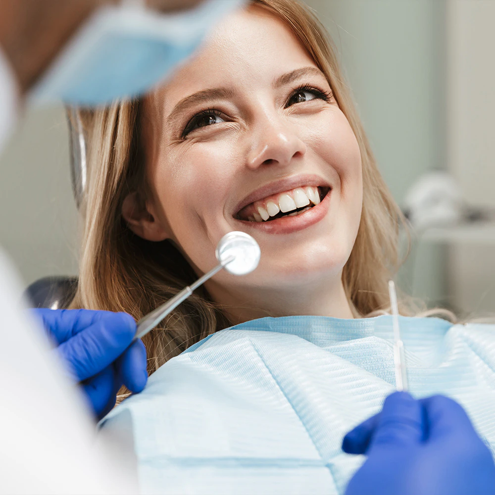 smiling woman in the dentist