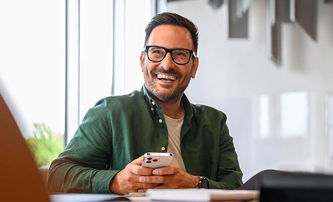 man smiling at work