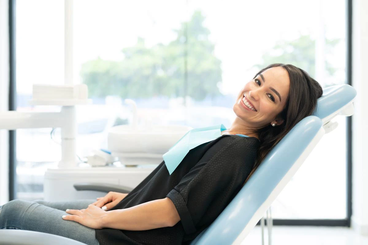 woman smiling in the dental chair