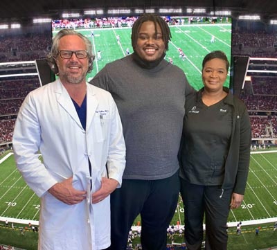 Dr. Cribbins with colleague and patient
