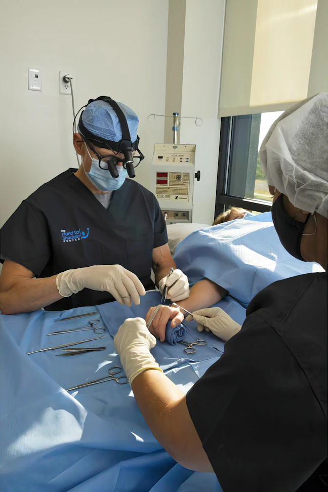 The Hand to Shoulder Center doctors performing surgery