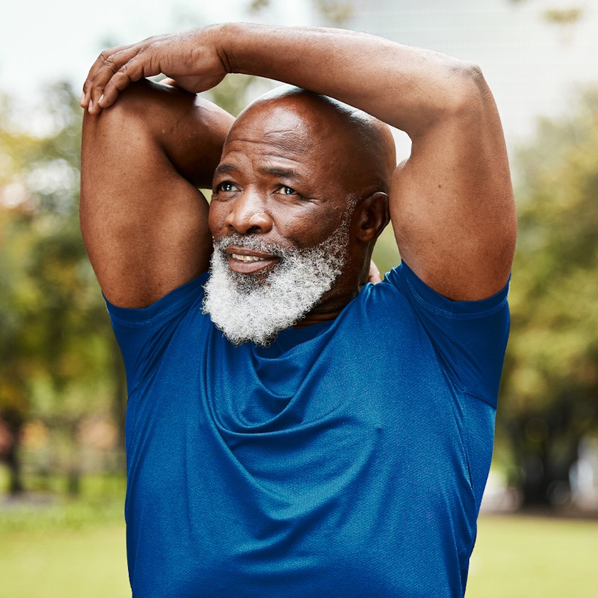 man stretching his arms