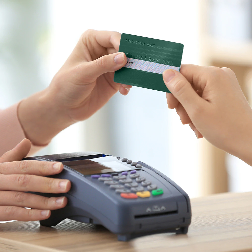 a person paying with a credit card