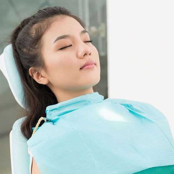 person taking oral sedation