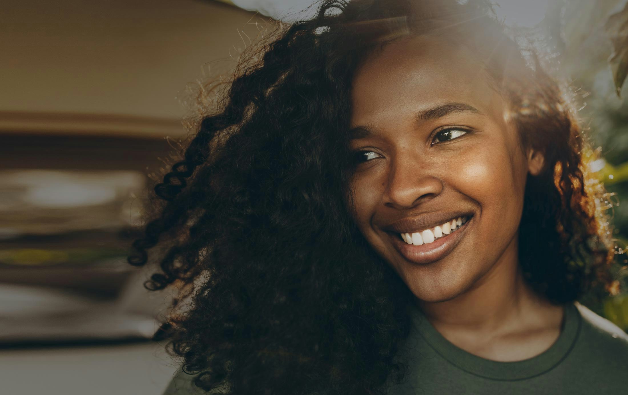 A woman with a beautiful smile at the dentist