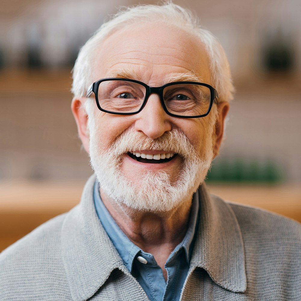 Smiling senior man with dentures