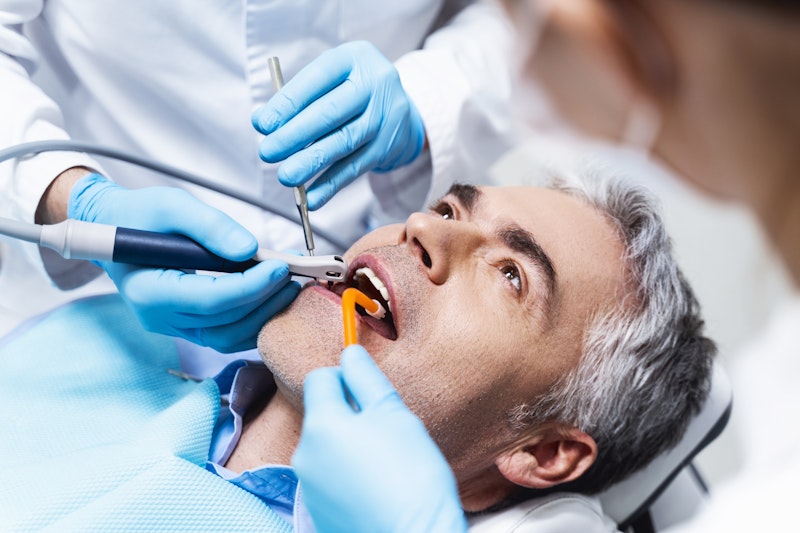 man receiving a root canal