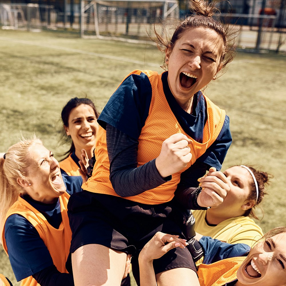 Women playing soccer