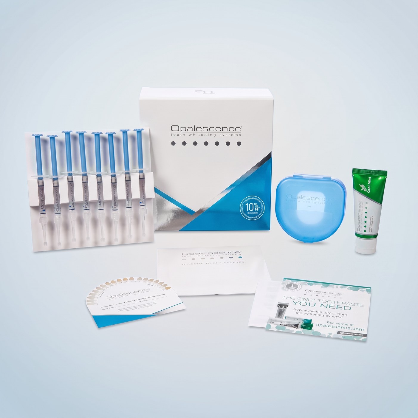 Opalescence PF take-home teeth whitening kit with prefilled gel syringes, custom tray case, and toothpaste