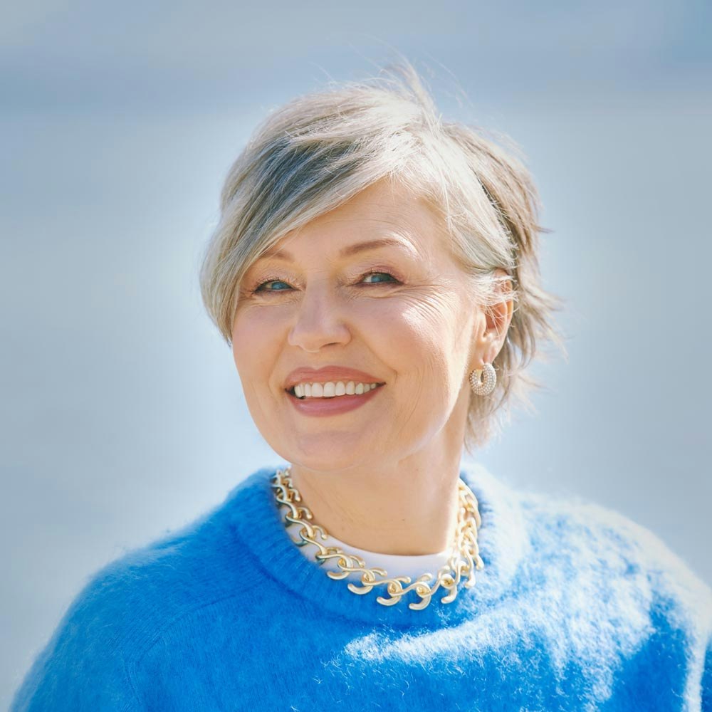 A mature woman with an attractive smile