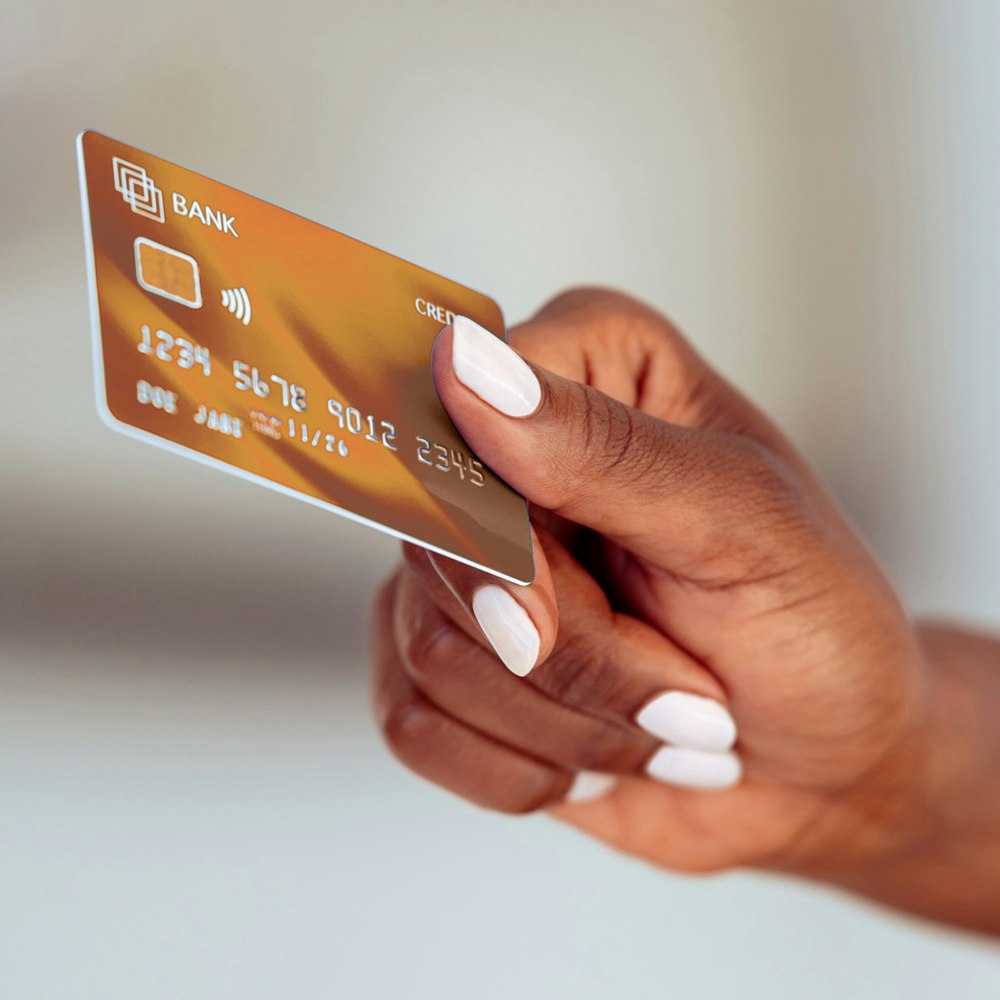 Person holding a credit card