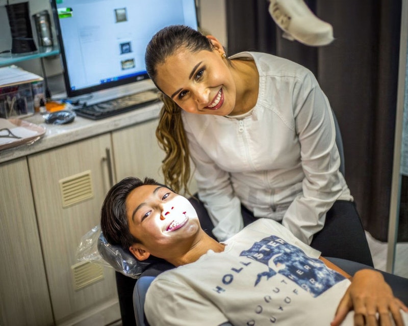Dr. Falcon and patient smiling