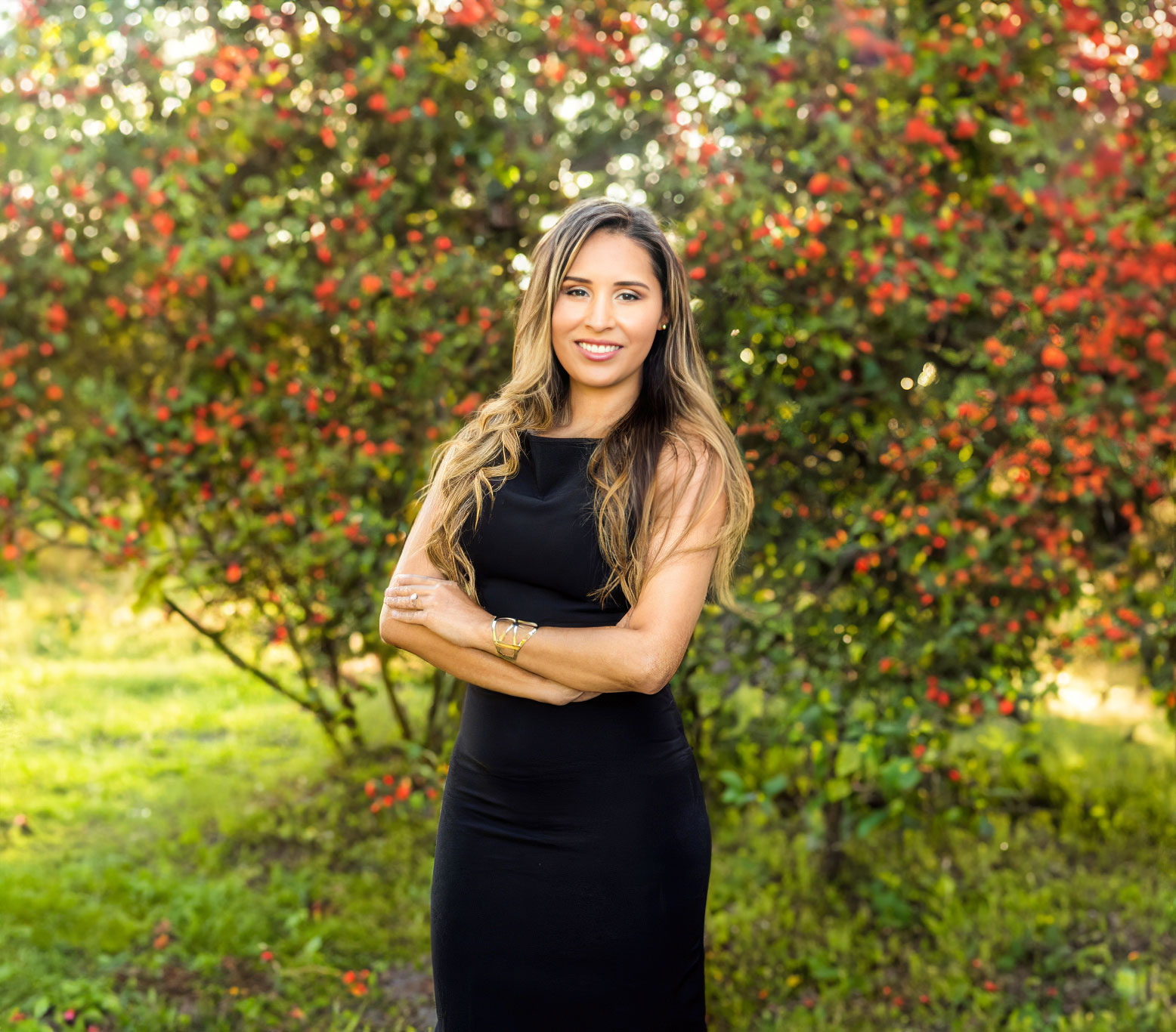 Dr. Falcon standing outdoors