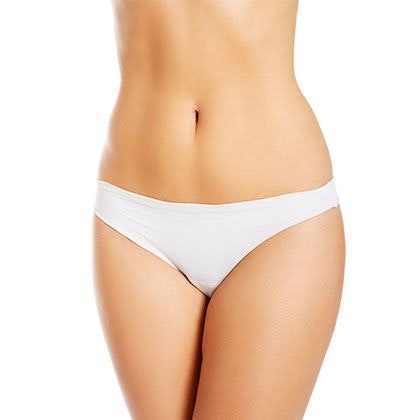 lower body image of a woman forward-facing, in white underwear