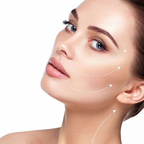 woman's face with contour arrows going up her cheeks and neck