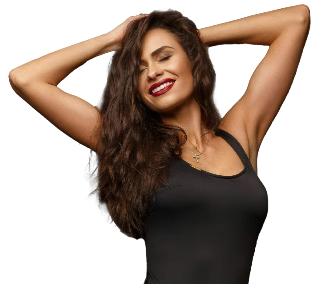 woman raising arms above her head and smiling