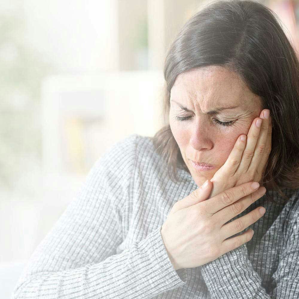 woman with jaw pain