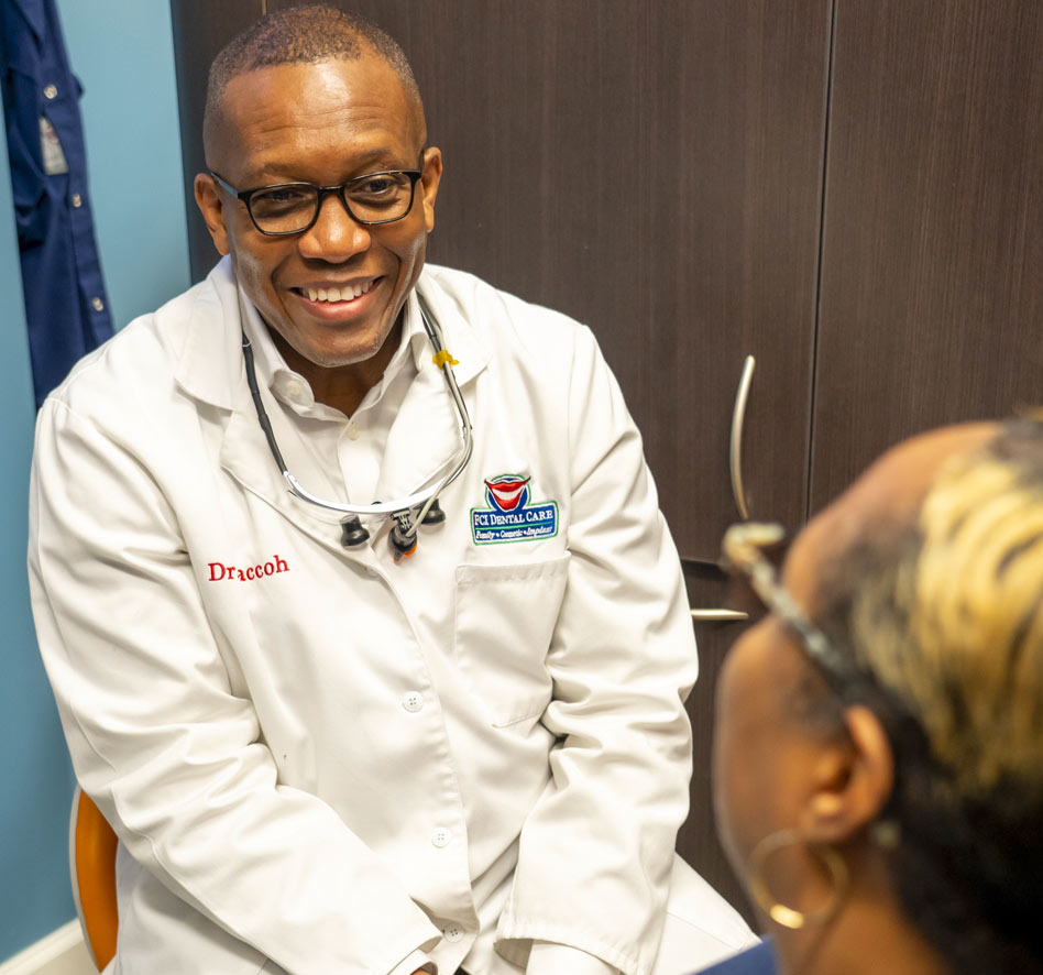 Dr. Saccoh and patient