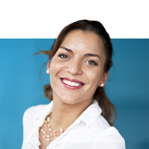 Smiling mature woman after dental crown treatment