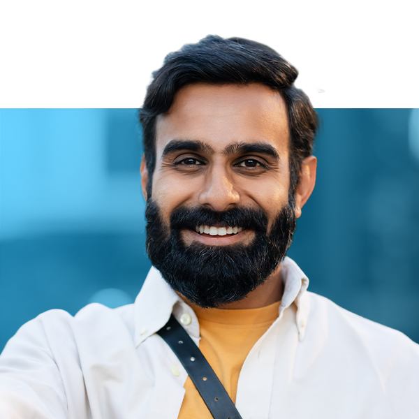 man smiling confidently after smile makeover