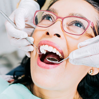 Woman getting a dental checkup