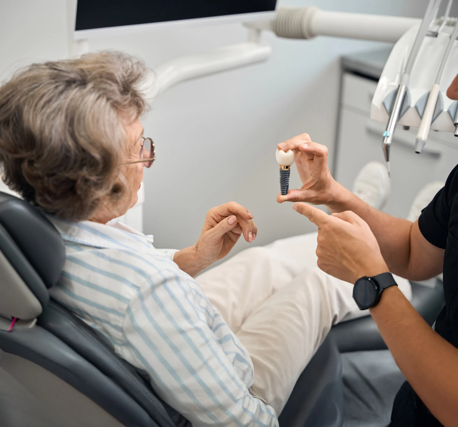 dental patient learning about implants