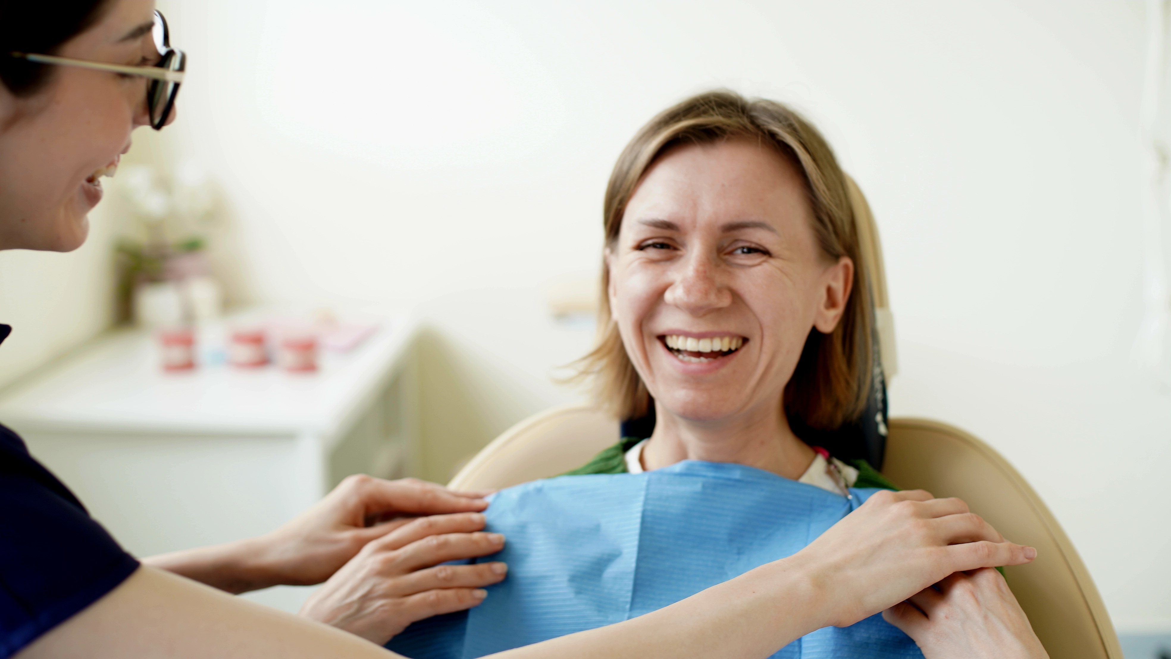 smiling woman in dentist
