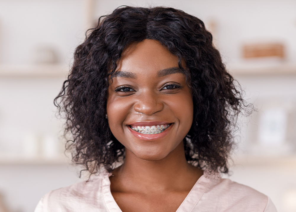 Smiling woman with braces
