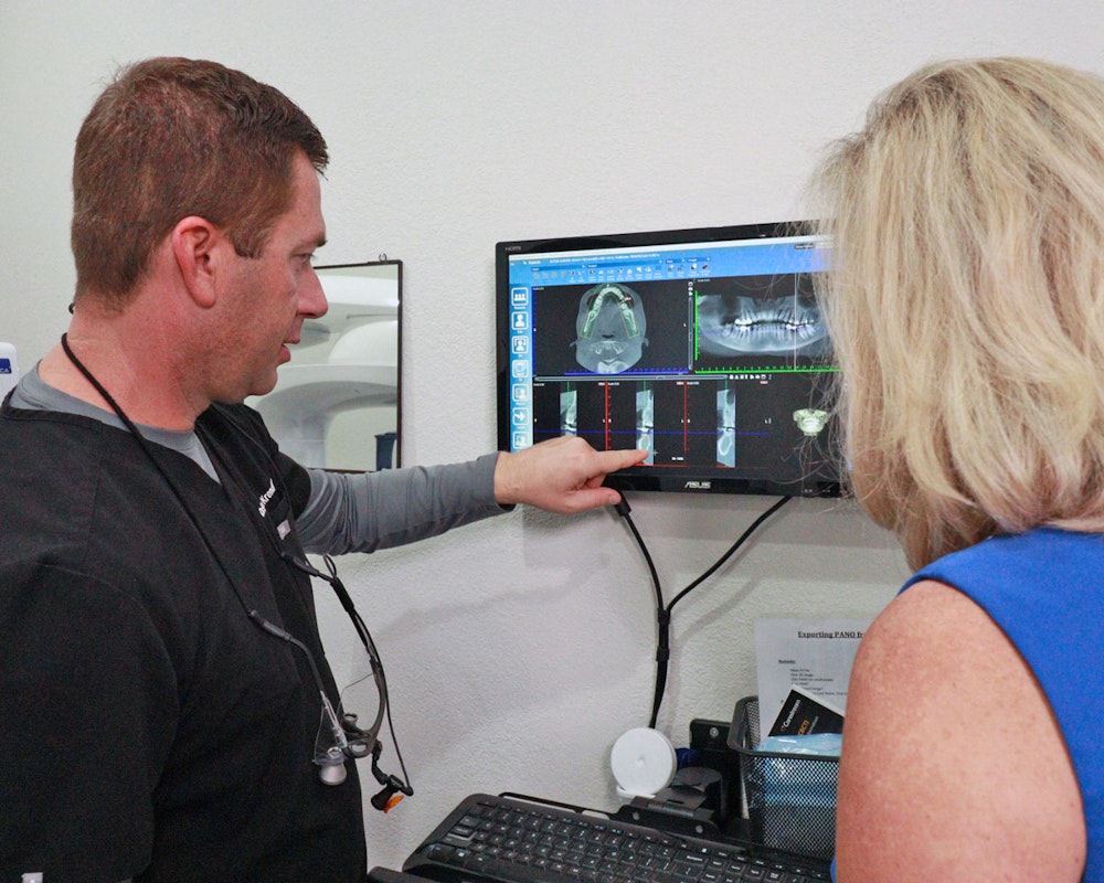 Doctor talking with patient