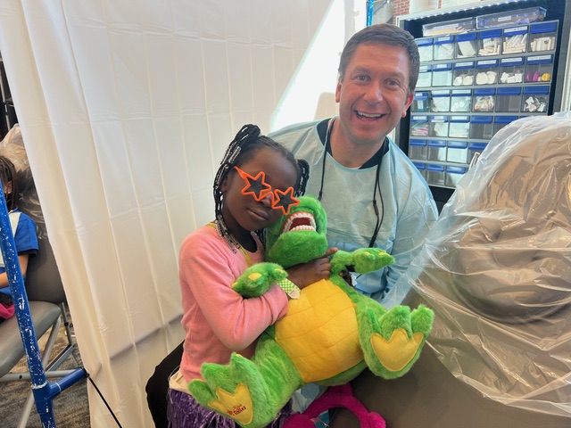 Dr. Krendl volunteering at team smile event