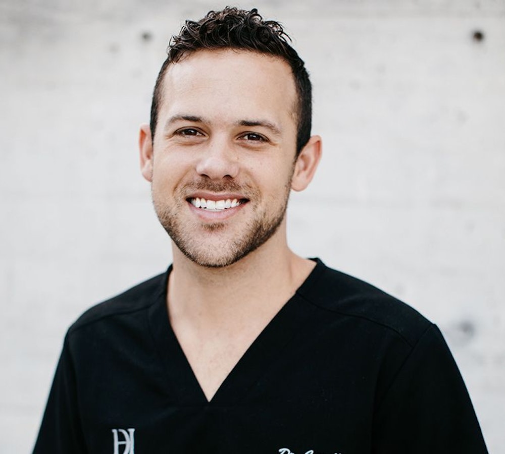 John-Morgan Correll, DMD and an image of the front door of the office